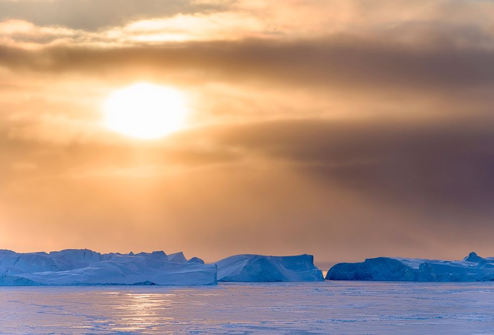 Sunset during winter at the Ilulissat Fjord-located in the Disko Bay in West Greenland art print by Martin Zwick for $57.95 CAD